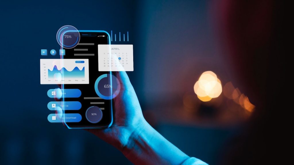 Hand holding smartphone displaying analytics dashboards and automation metrics representing AI-driven content production and performance tracking