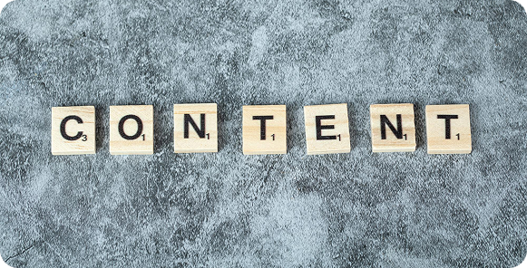 Arrow with an upward path on white background, curving over three wooden blocks, symbolizing growth or progress. Minimalist and motivational theme.