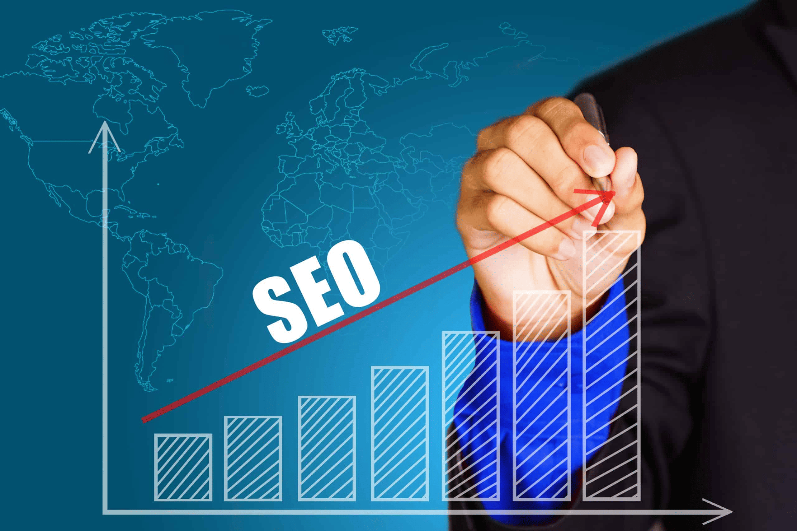 Hand draws upward arrow on bar graph labeled SEO in front of a world map, symbolizing digital growth and success in search engine optimization.